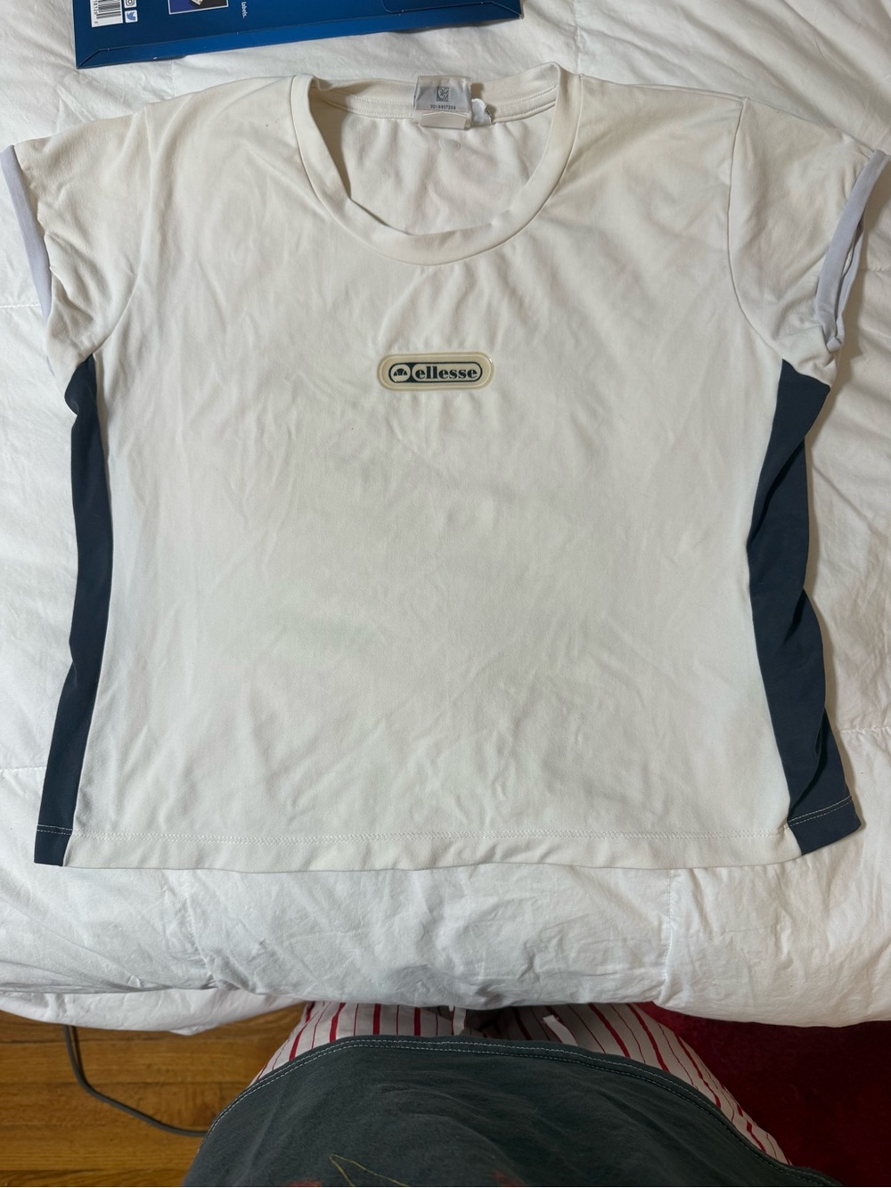 Ellesse White Tee with Navy Side Panels and Center Logo